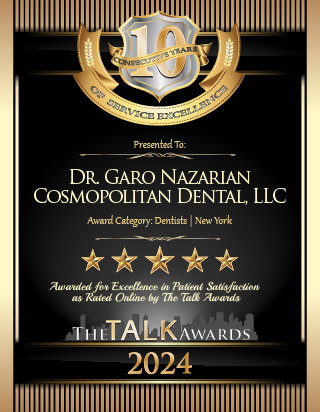 An award plaque with gold text on a black background, featuring a name, a dental practice logo, a certificate number, and stars indicating recognition for excellence in patient satisfaction.