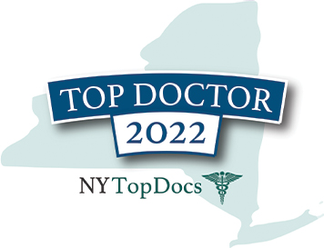 The image features a logo with the text TOP DOCTOR 2021 prominently displayed above an illustration of the state of New York, indicating a connection to New York for a top doctor accolade in the year 2021.